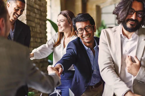 Biox Tradeasia partners shaking hands at a meeting